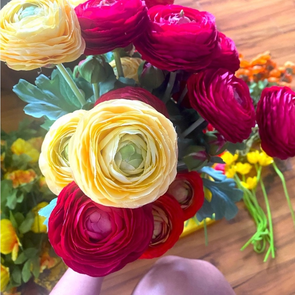Flowers. They look real! Ranunculus and anemones.